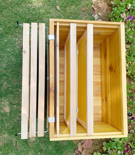 Jashem space-saving equipment helps reduce clutter in the apiary.