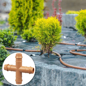 Jayee 1/2-inch tubing four-way cross helps create expanded irrigation networks quickly.
