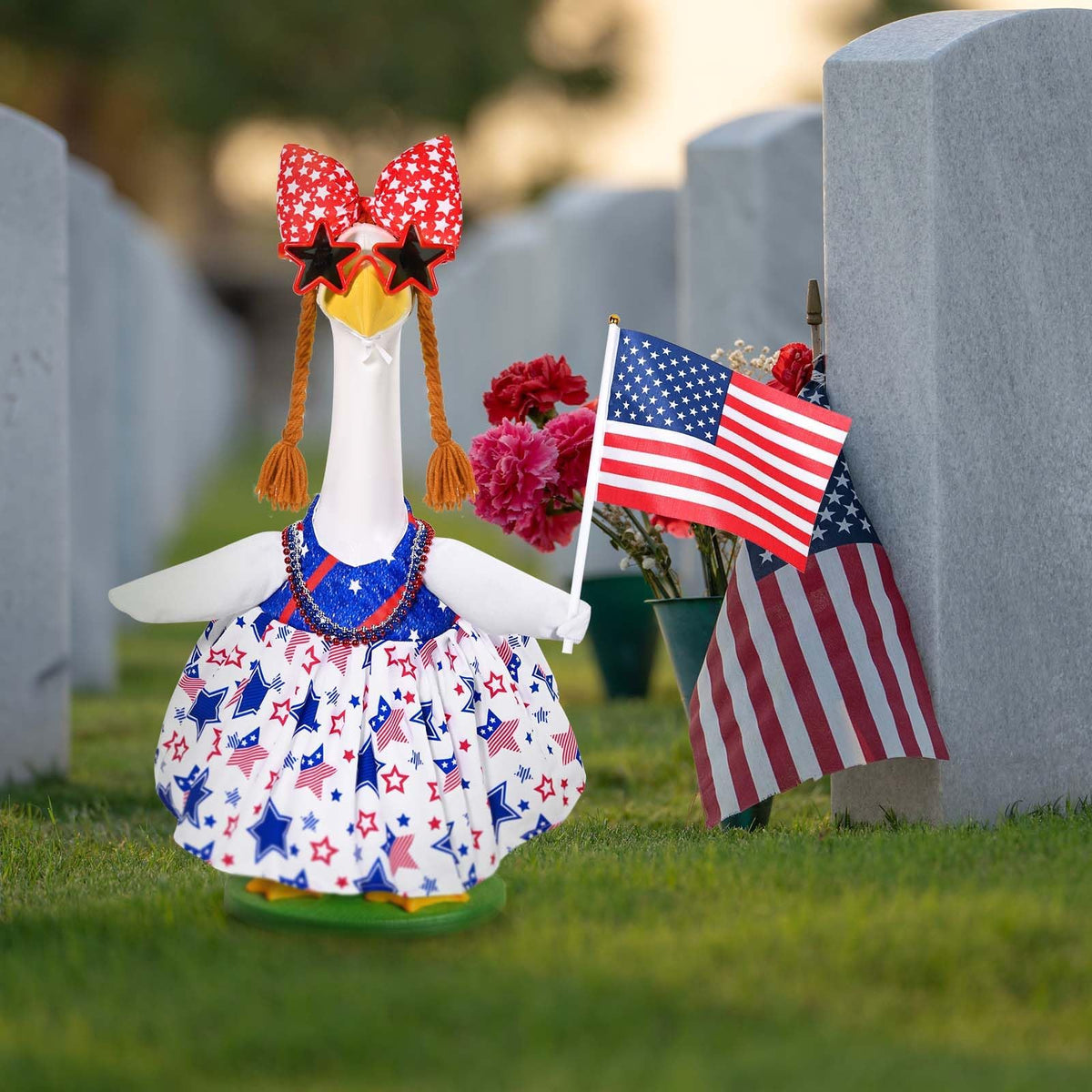 JcHrmers American flag accessory complements yard displays with quick outfit changes.