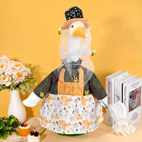JcHrmers colorful goose outfit brightens garden and patio settings.