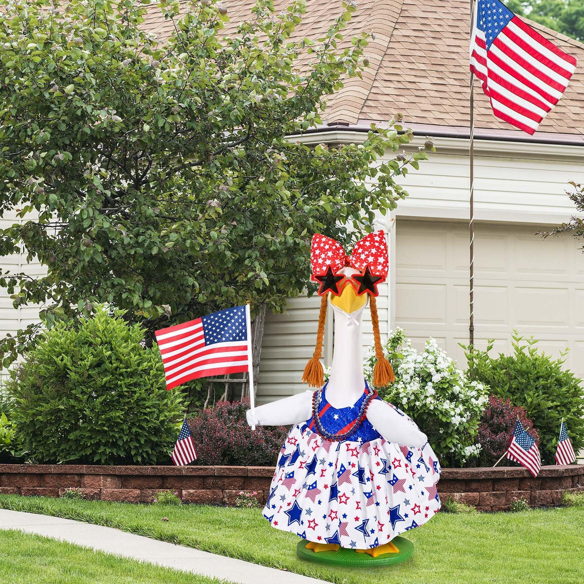 JcHrmers patriotic garden decoration enhances outdoor party ambiance.