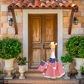 JcHrmers patriotic outfit enhances outdoor party ambiance on the porch.