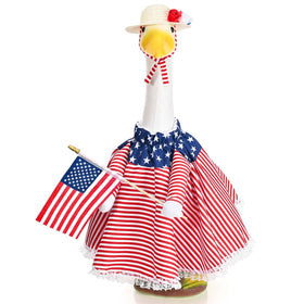 JcHrmers patriotic goose outfit with straw hat boosts porch curb appeal.