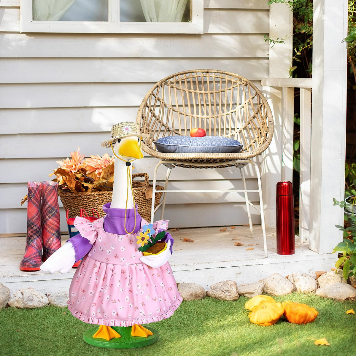 Porch goose on lawn adding seasonal garden vibe by JcHrmers