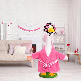 JcHrmers pink spring-summer goose costume brightens garden accents.