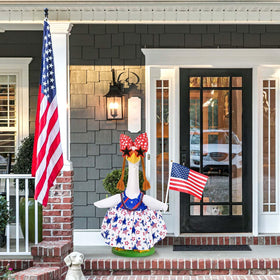 JcHrmers yarn wig creates a lifelike, charming porch display.