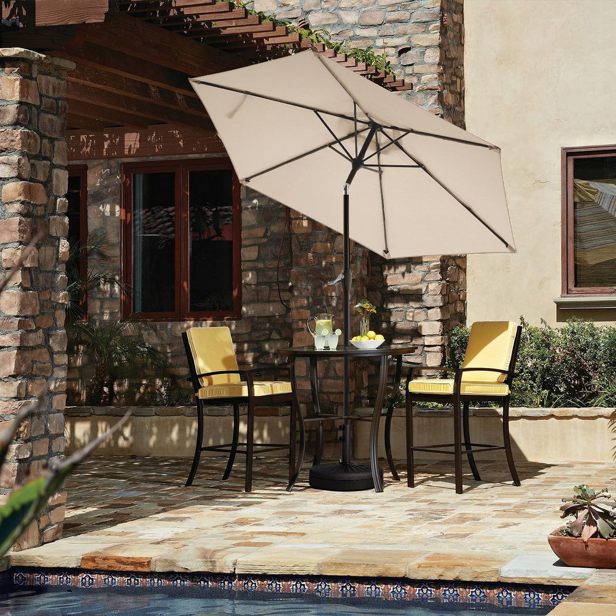 JEAREY cream beige umbrella adds classic style to any outdoor space.