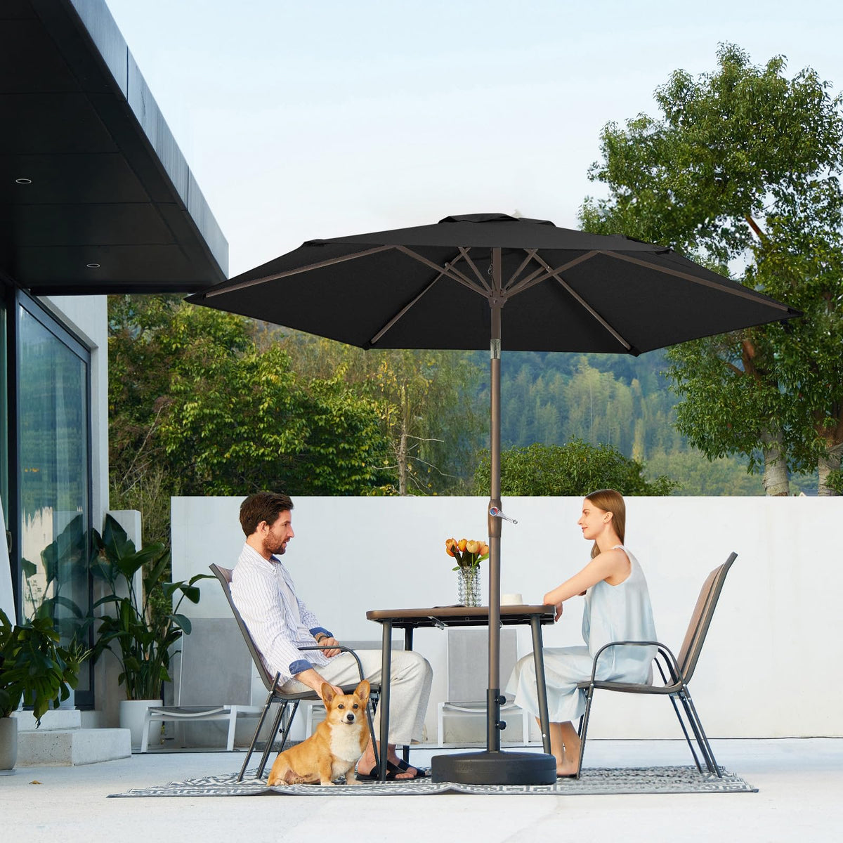 JEAREY dark black umbrella enhances any patio décor.