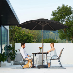JEAREY dark black umbrella enhances any patio décor.