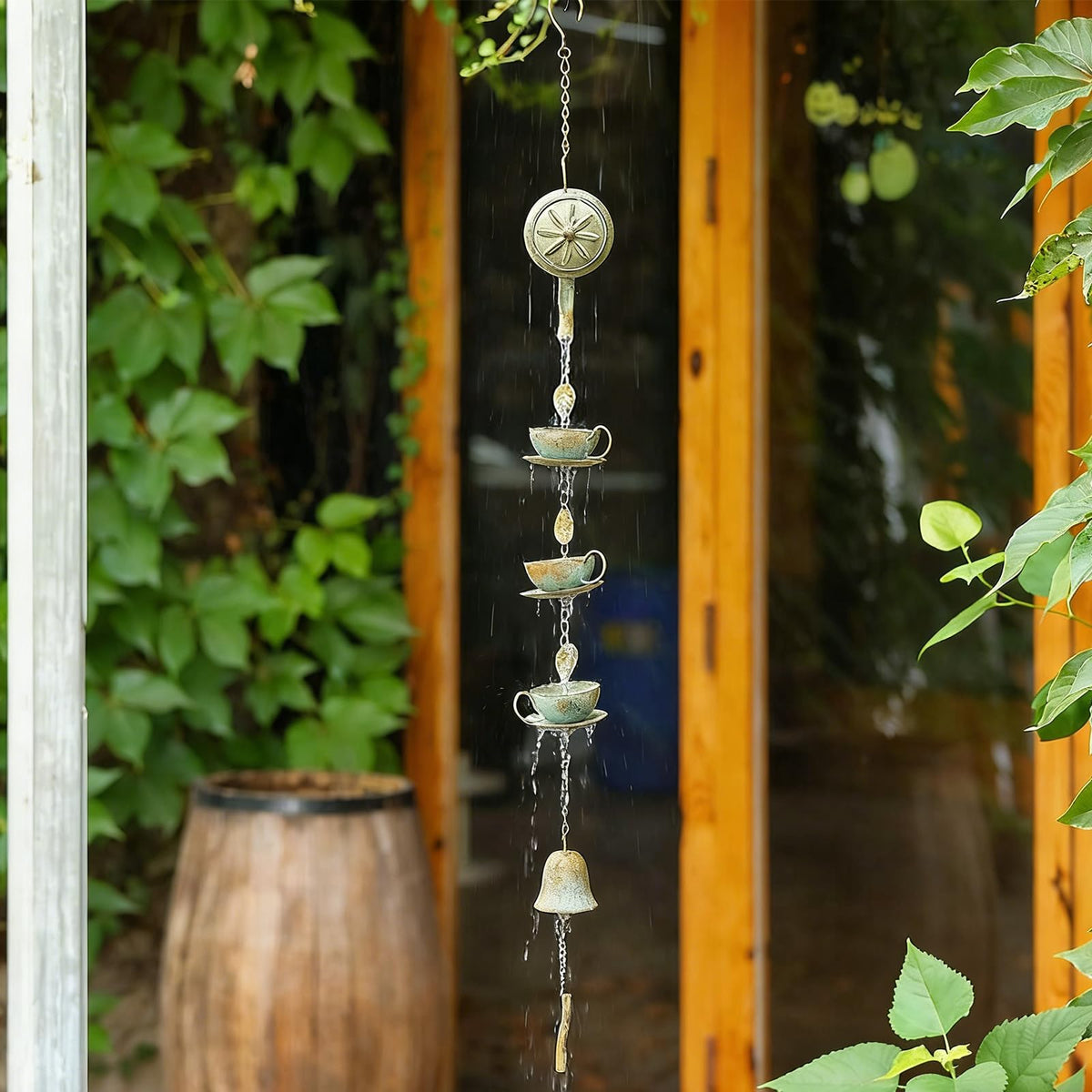 Jemeni tea cup and saucer rain chain hangs vertically with gentle sound