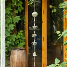 Jemeni tea cup and saucer rain chain hangs vertically with gentle sound