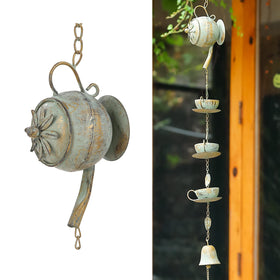Jemeni teapot rain chime in green patina adds vintage charm to outdoor spaces