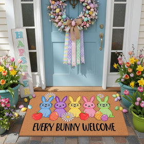 Jenaai Easter doormat with five pastel bunnies welcomes guests.