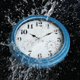 Waterproof JENLYSTIME clock on porch or garden setting