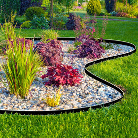 JERIA outdoor border along a courtyard creates a tidy, welcoming area.