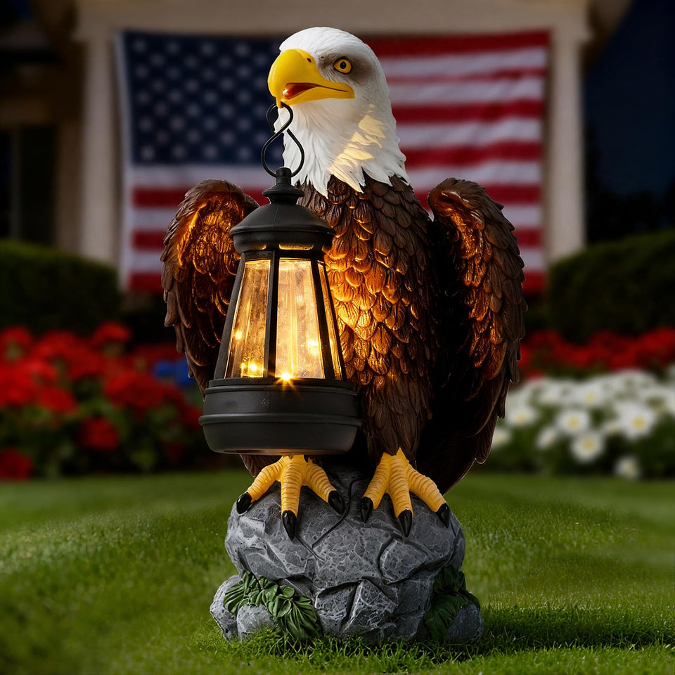 Jesokiibo bald eagle statue with solar light illuminating dusk in the garden.