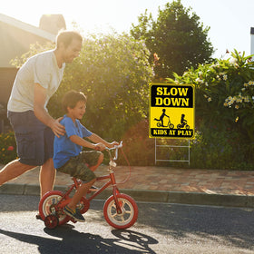 Jetec yard sign in use showing street caution near homes