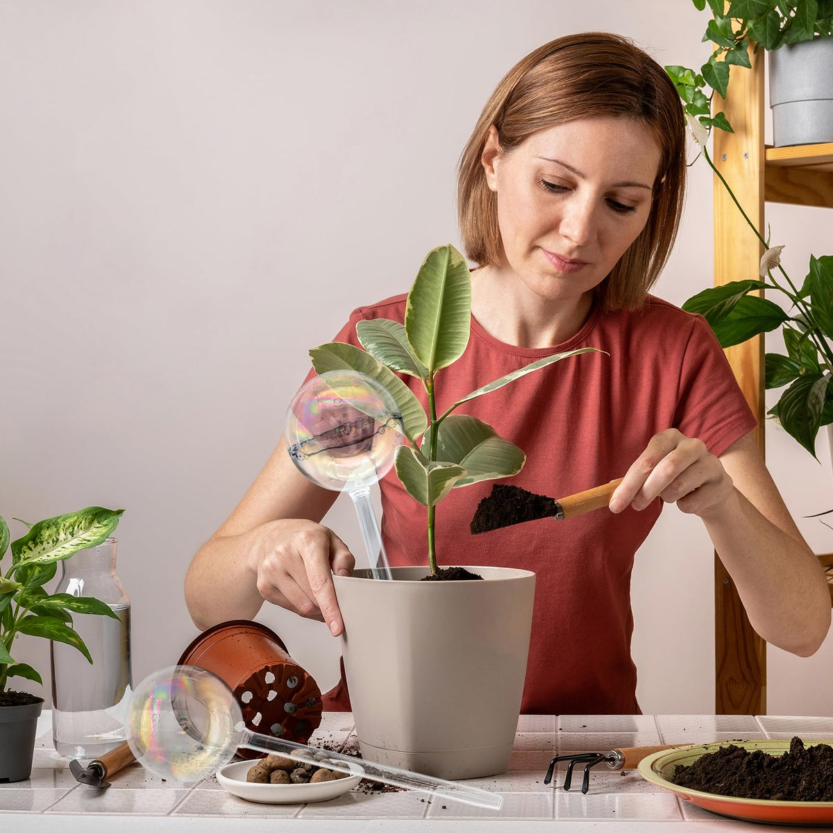 Jgalnim auto-watering globes offer hands-off irrigation for busy gardeners.