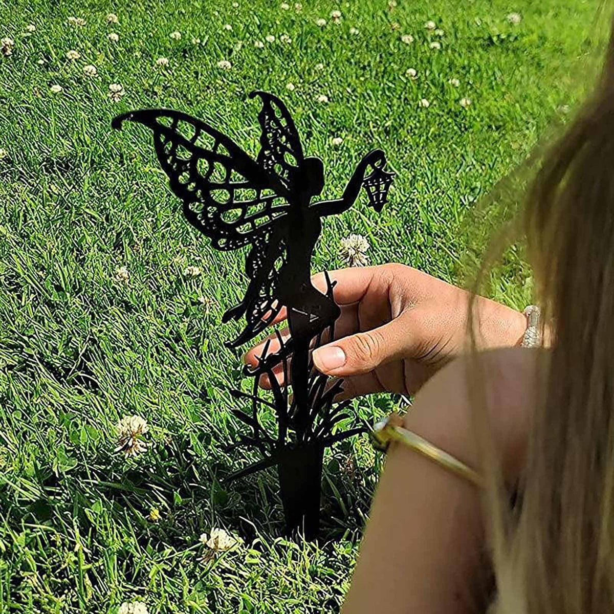 JGZTJXNK metal garden statue stake creates a magical focal point.