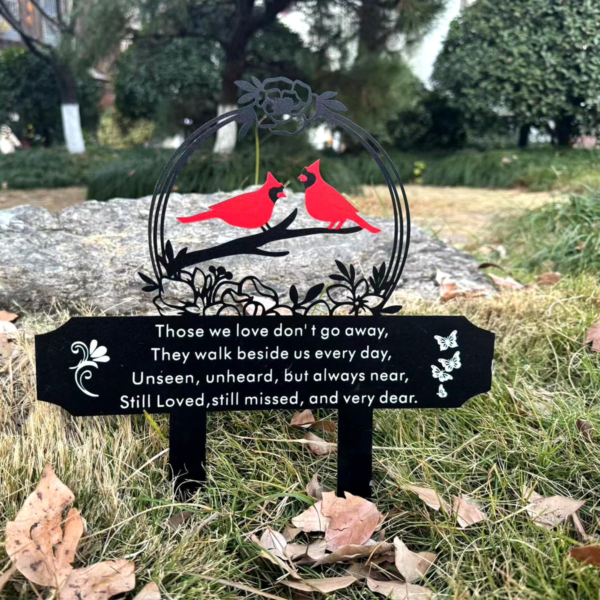Jiasku Cardinals Memorial Stake in a garden demonstrates a heartfelt outdoor tribute.