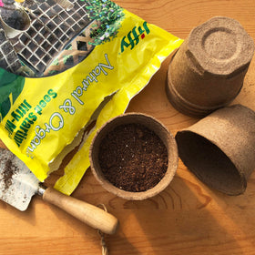 Jiffy 10 qt seed starting mix bag back view with usage tips.