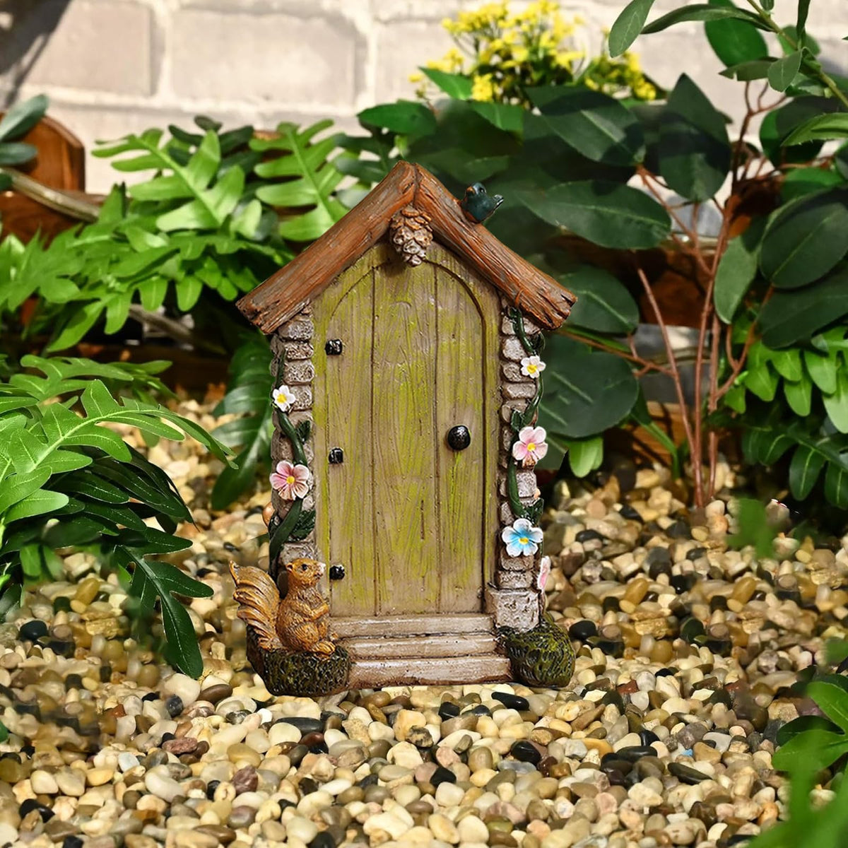 JIUMO fairy door with flower vine and bird accents enhances natural garden appeal.