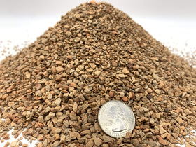 JK Global Imports calcined clay granules close-up shows uniform 1/8-inch size.