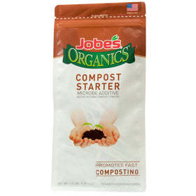 Jobe's Organics compost starter bag spread on a backyard pile for faster breakdown
