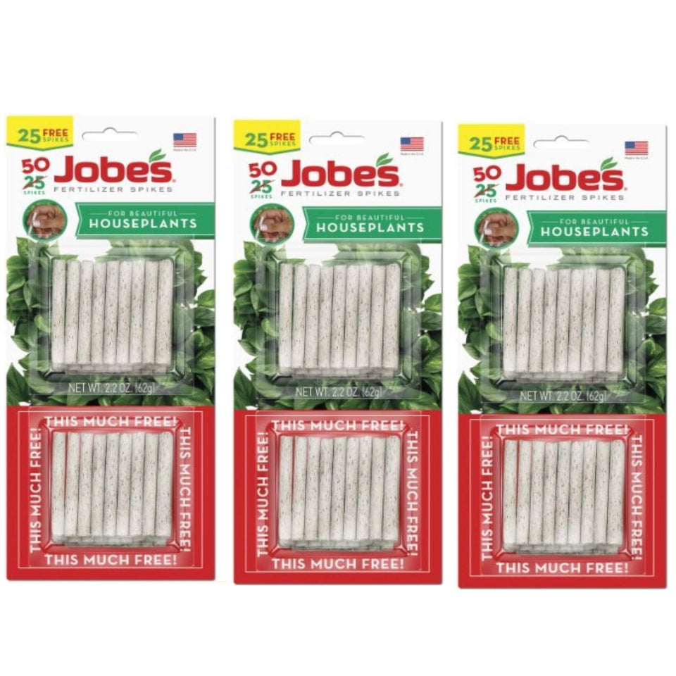 Jobe's Organics houseplant spikes placed in soil for easy, slow-release feeding