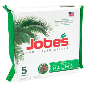 Close-up of 10-5-10 spikes showing the slow-release formula for palm nourishment.