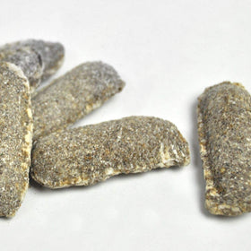 Jobe's Organics spikes being pressed into soil for easy use