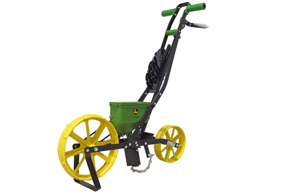 John Deere 3lb garden seeder front view with precise seed placement in prepared soil.