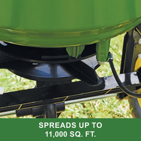 John Deere push handle offers stable control while walking behind the spreader.