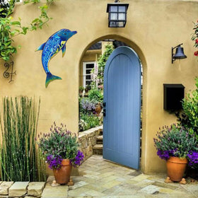John's Studio sea-themed wall art creates a warm conversational focal point.