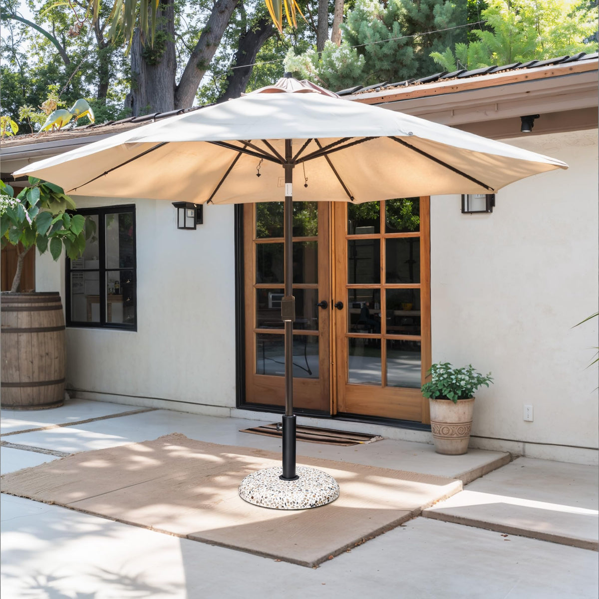 JOINHOM rustic pebble-white umbrella base on deck enhances patio aesthetics.