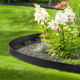 Jorvila landscape edging around lawn and flower beds for tidy yard borders.