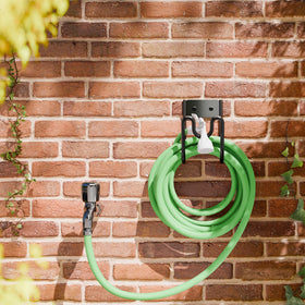 Josmimic versatile outdoor holder for hoses, cords, and air hoses.