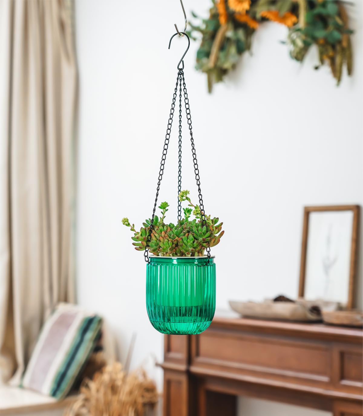 Josteve planter can hang or sit on a table for versatility