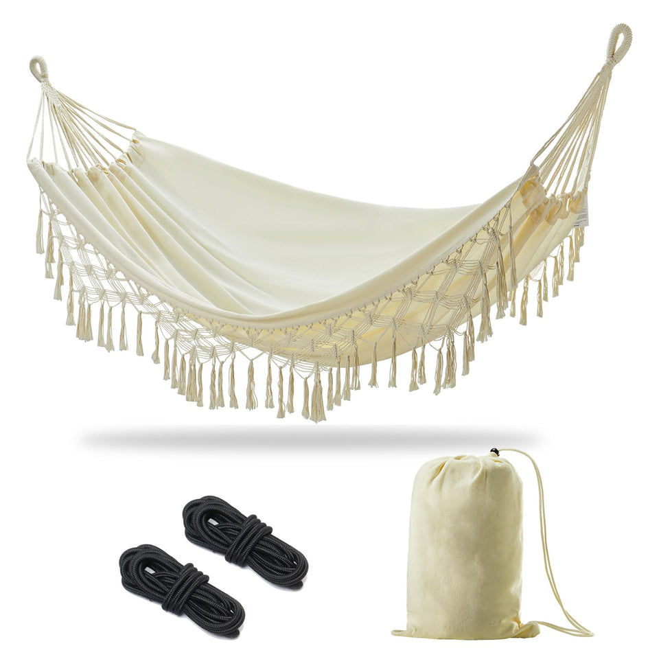 JoyView Boho Macrame Double Hammock with tassels, perfect for breezy outdoor lounging.
