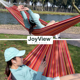 JoyView striped hammock outdoors on patio for everyday lounging