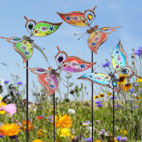 Juegoal butterfly stake in potted plant display for patio decor.