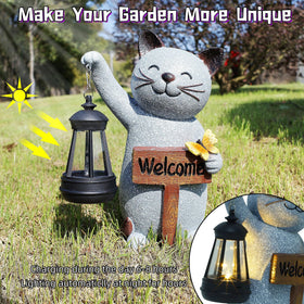 Juegoal illuminated cat statue with warm light at night