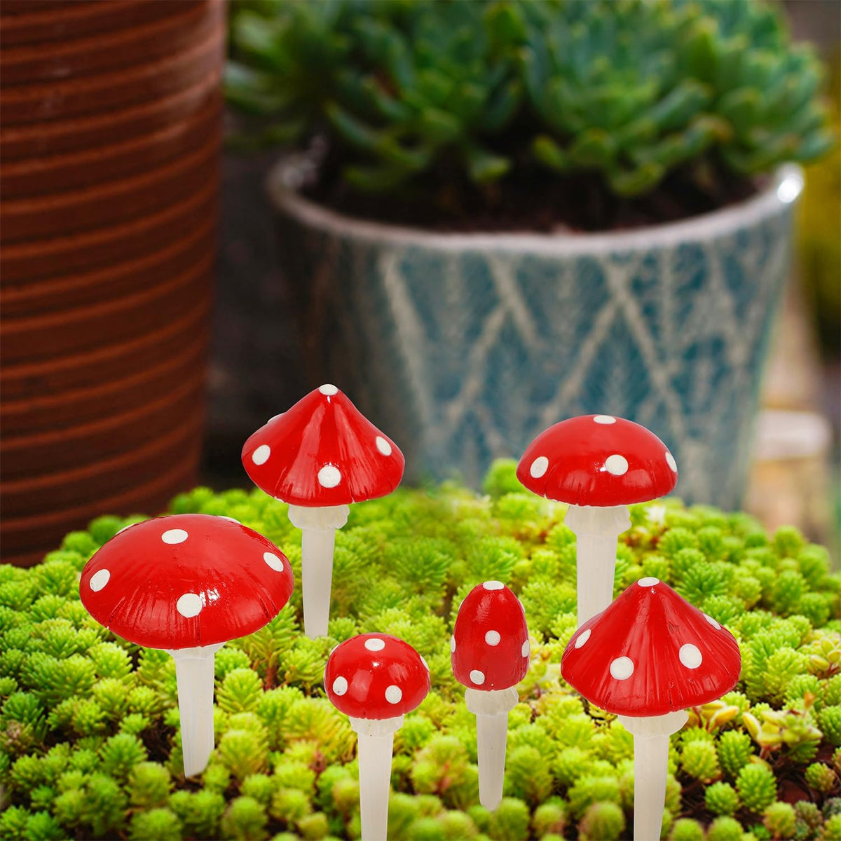 Juegoal miniature mushroom statues in resin, durable outdoor accents.