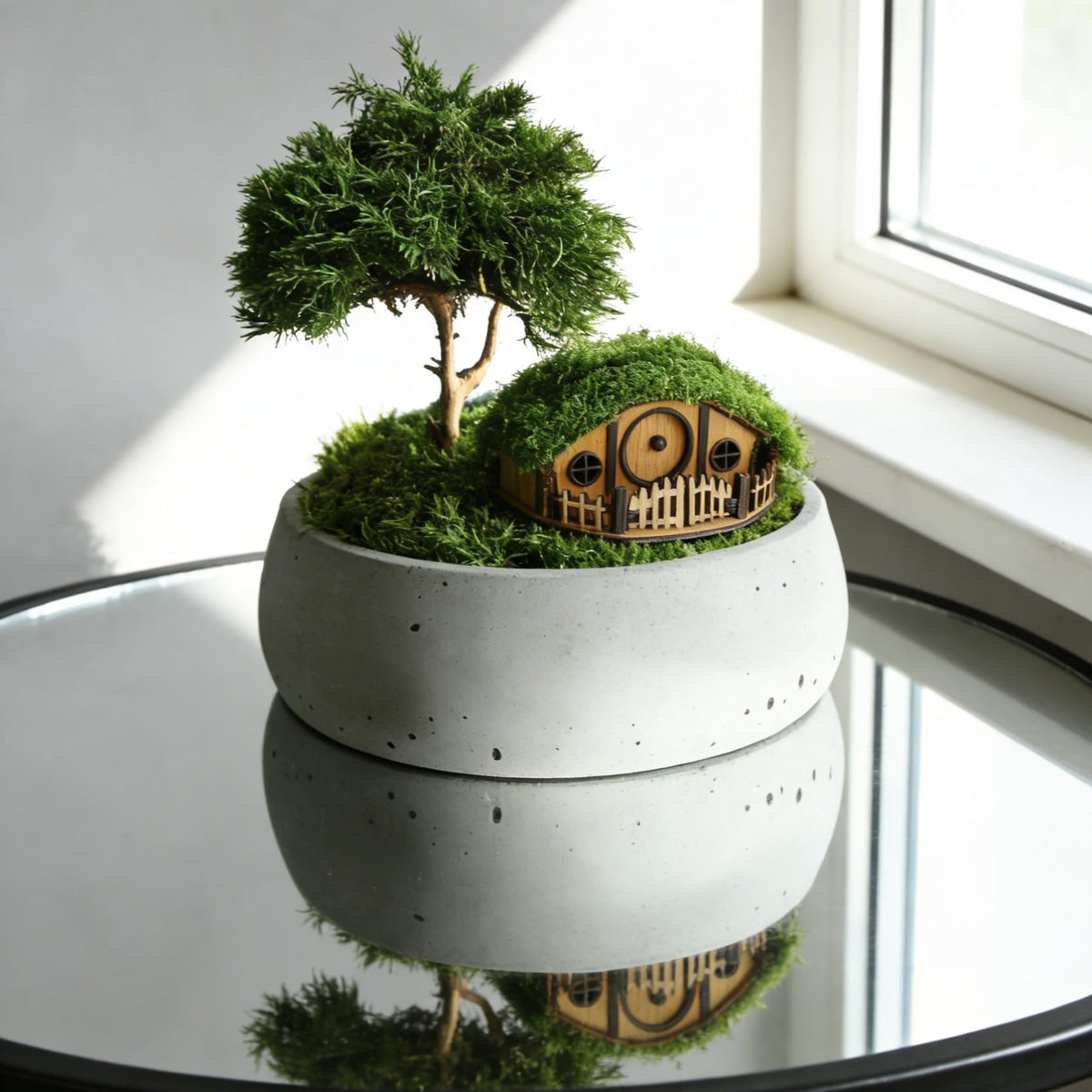 JULEASEL Mosswood mini treehouse wooden detailing brings rustic warmth.