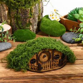 JULEASEL Mosswood mini treehouse in plant pot creates layered displays.
