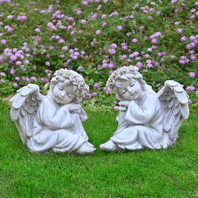 Juliahestia outdoor angel statue halo glows at dusk for memorial spaces