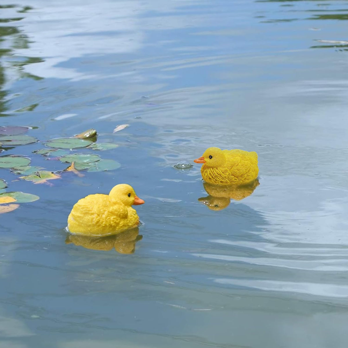 Juliahestia resin duckling figurine is weatherproof for outdoors