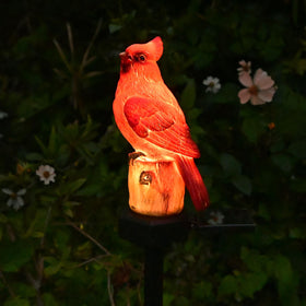 Juliahestia weatherproof resin bird statue stands up to sun and rain.