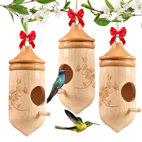 JulktLli hummingbird house in rubber wood attracts birds to the garden.