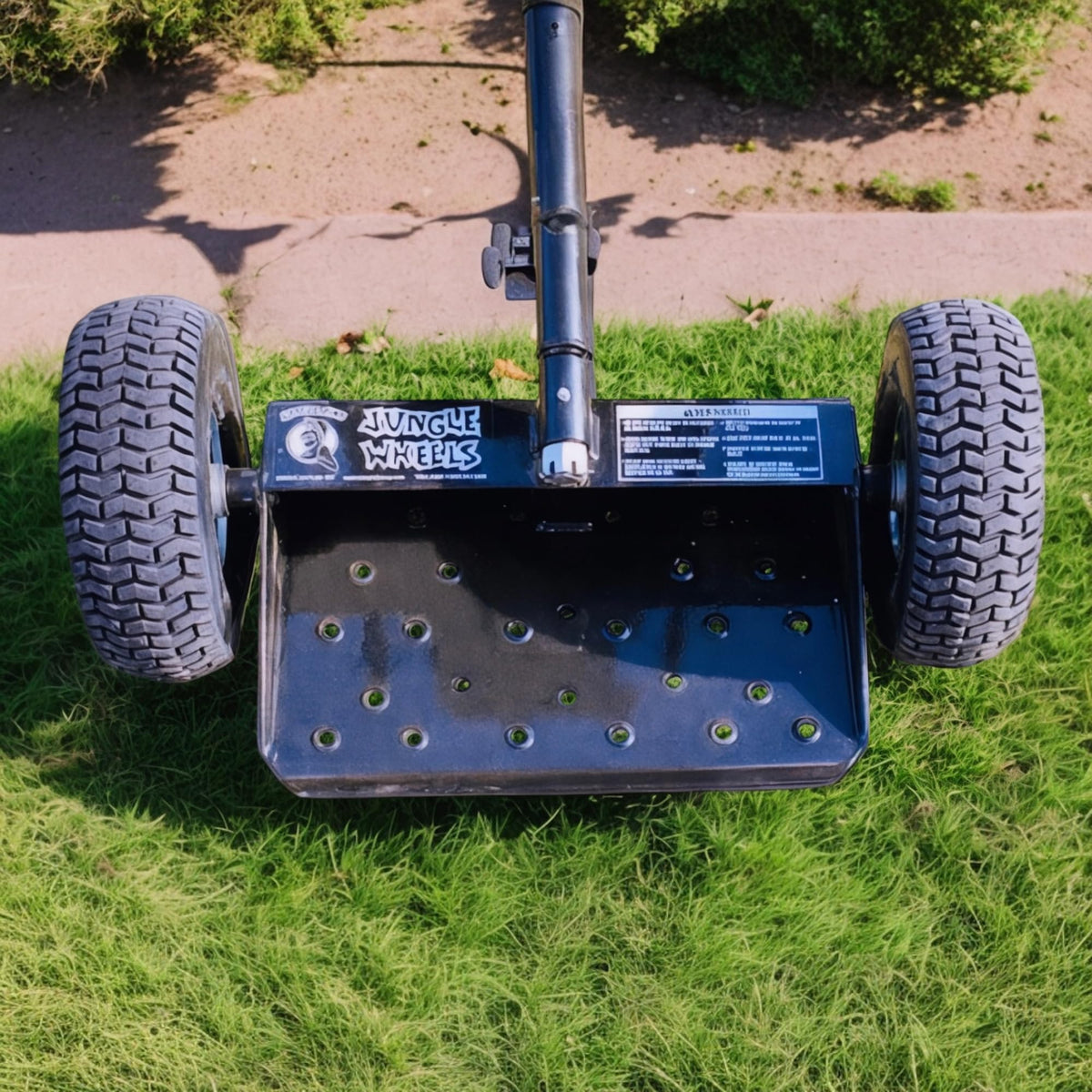 Jungle Jim's Jungle Wheels rear-weighted frame protects turf during operation.